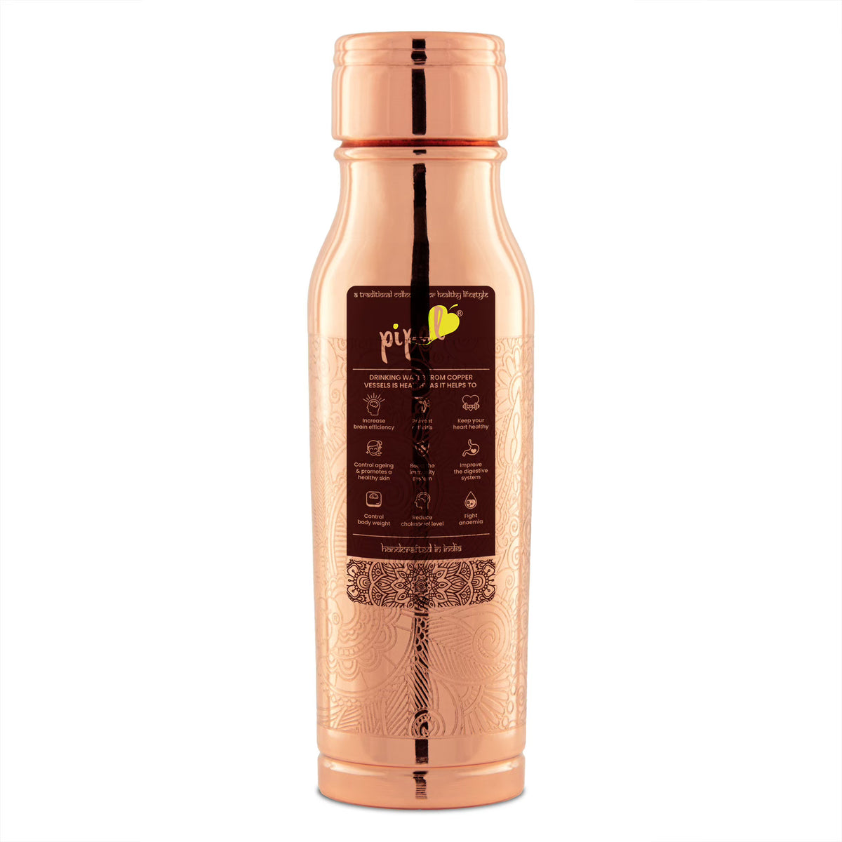 pipal yoga copper bottle with carving on it