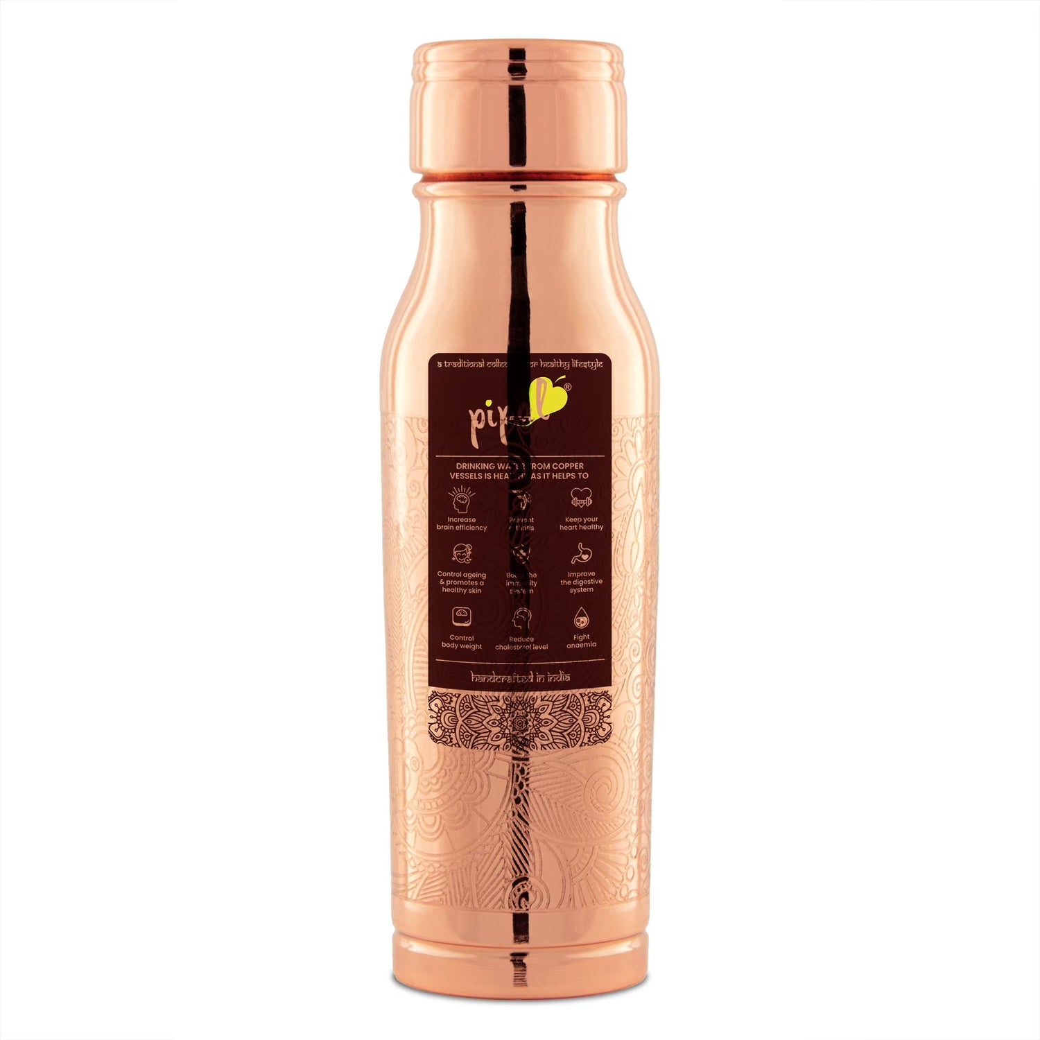 pipal yoga copper bottle with carving on it