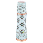 Decorative copper water bottle with floral pattern on a white background