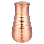 Pipal Wave series copper carafe with ribbed ridges and hammered texture