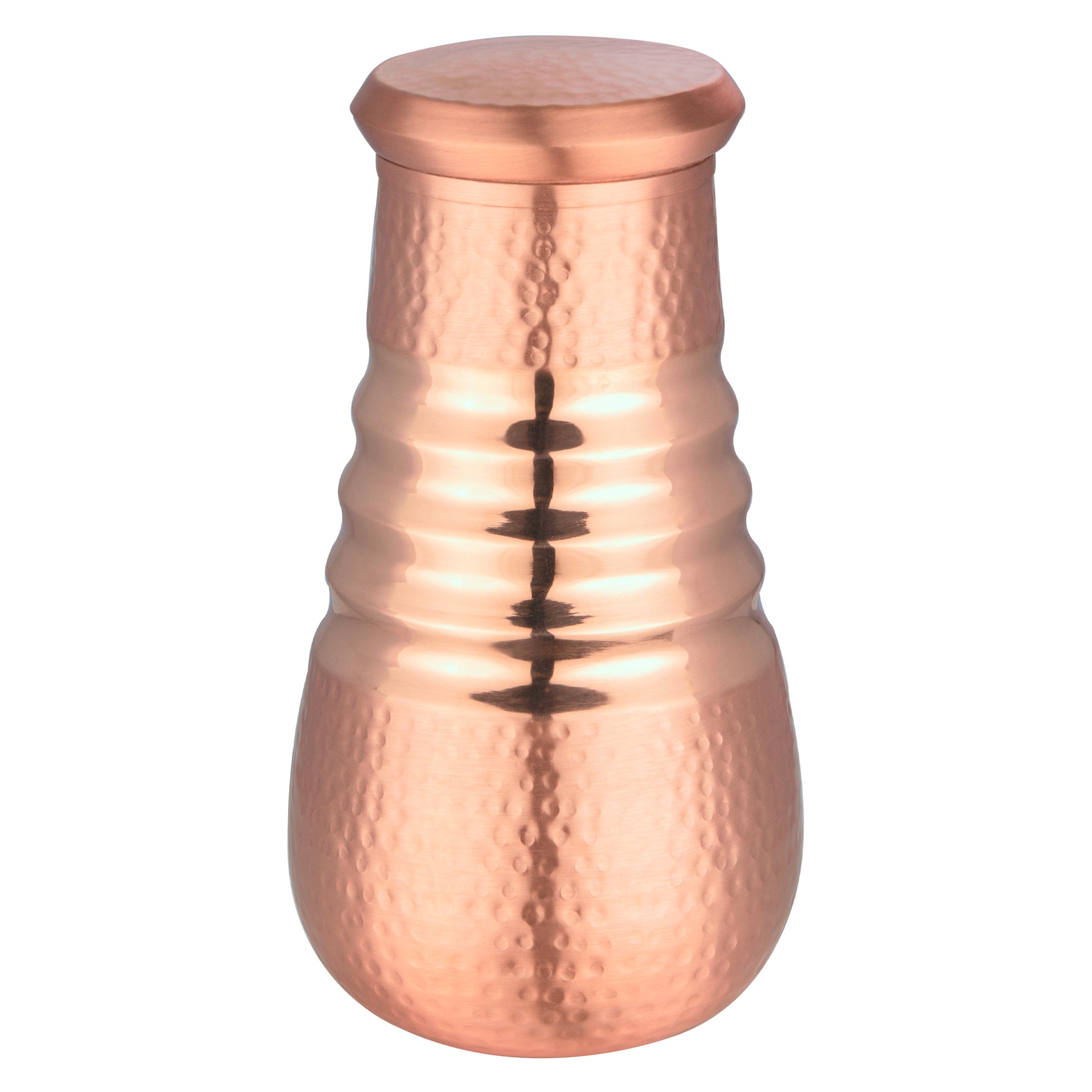 Pipal Wave series copper carafe with ribbed ridges and hammered texture